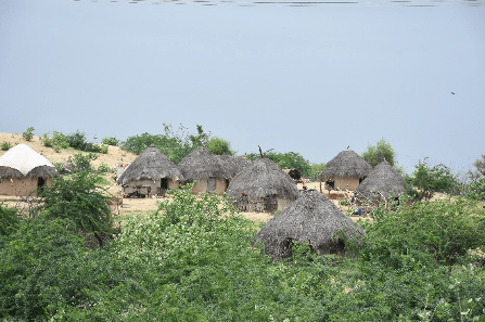  Mud thatch huts along the highway. — Photo provided by author 