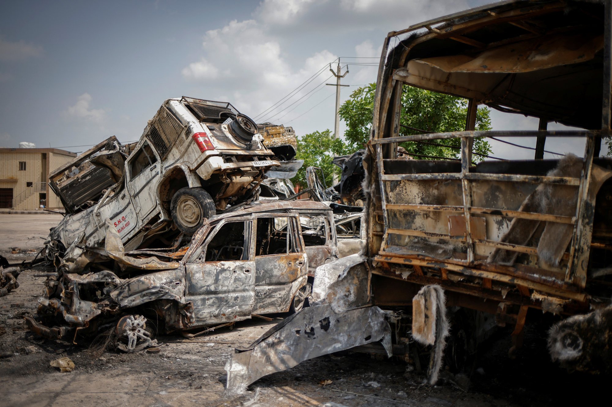 Burnt-out vehicles are seen in Haryana’s Nuh district this month following communal clashes between Hindus and Muslims. Photo: Reuters