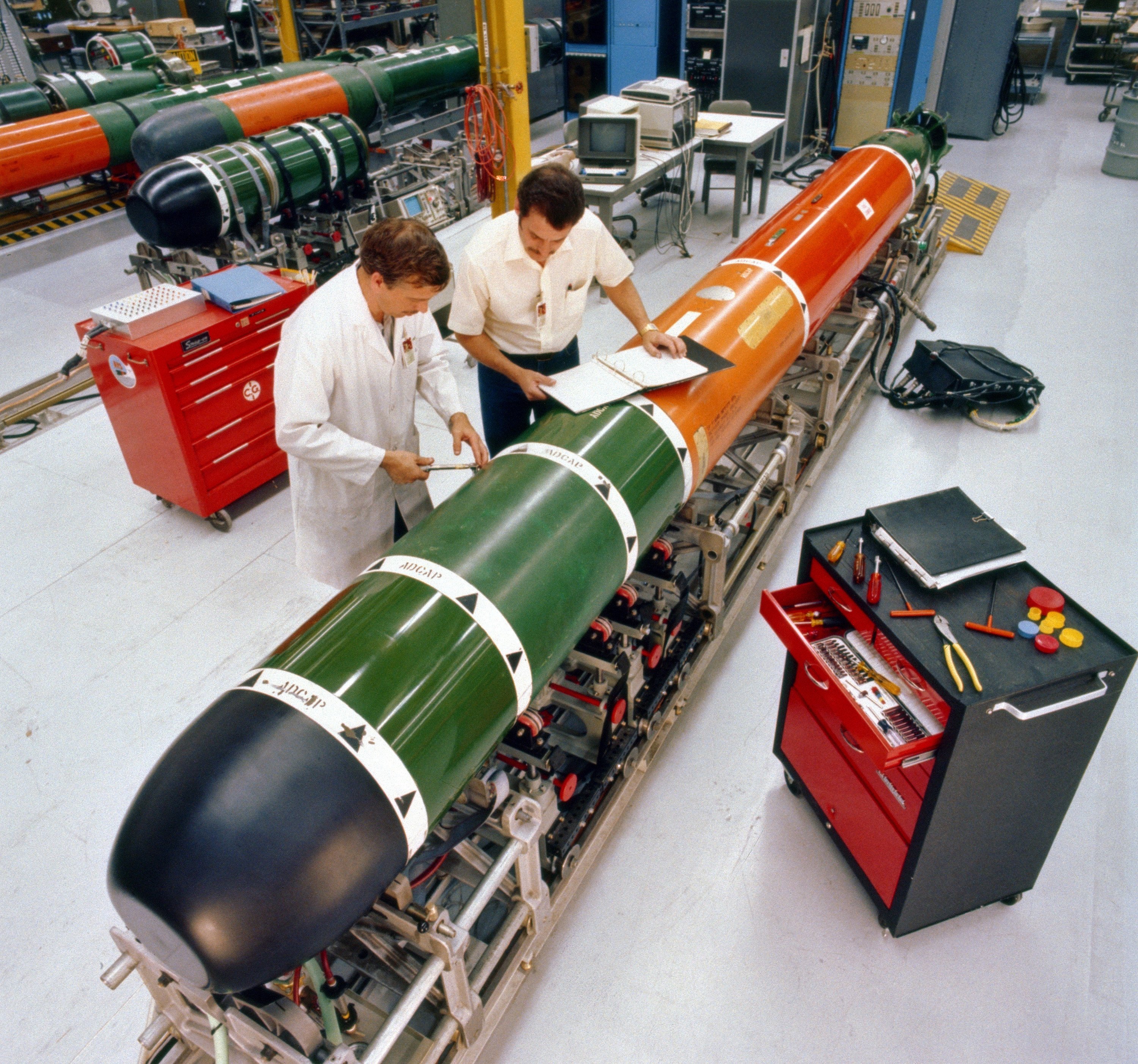 Mk_48_torpedo_maintenance_1982.JPEG