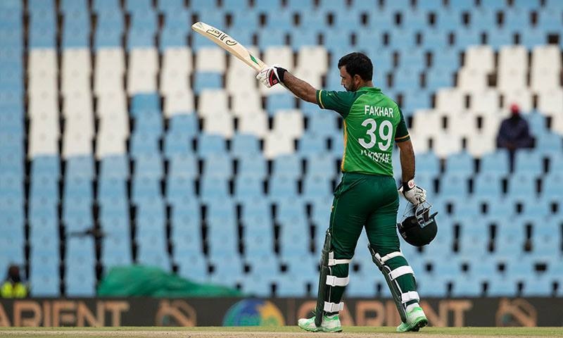 Fakhar Zaman raises his bat after hitting his second successive century. — AFP