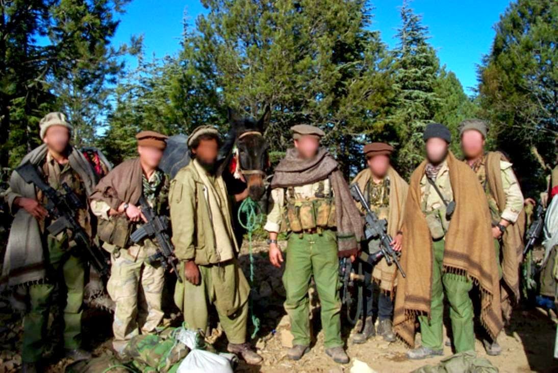 Delta_force_GIs_disguised_as_Afghan_civilians%2C_November_2001_C.jpg