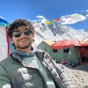 Portrait of smiling Kashif in K2 Base Camp