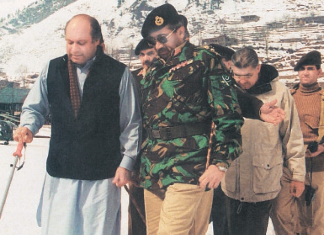 Prime Minister Nawaz Sharif and Chief of Army Staff Pervez Musharraf walking through the snows in the Keil Sector in Azad Kashmir near Rawalakot in February 1999. - Photo: AFP