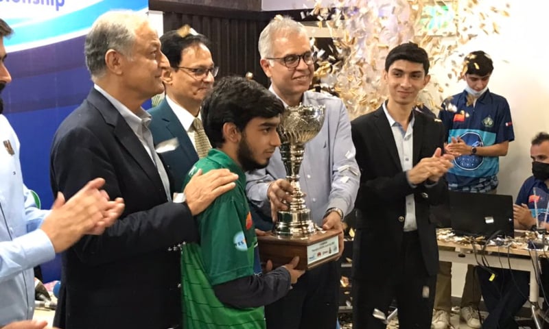 Syed Imaad Ali holds the trophy after winning the World English Scrabble Players Association Youth Cup in Karachi. — Photo courtesy Quetta Gladiators Twitter