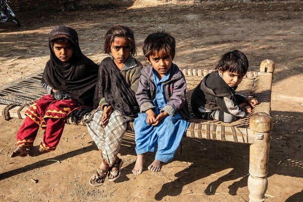 Rabia, 5, Gulshad, 5, Sarif, 4, and Ilyas, 3, in February. The children, all H.I.V.-positive, live in a village outside Ratodero.