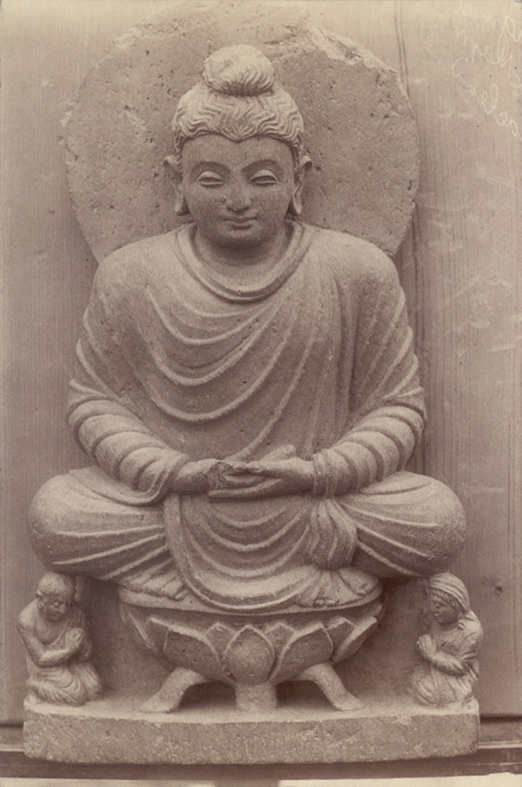 Statue_of_a_Buddha_seated_on_a_lotus_throne_in_Swat_Valley.jpg