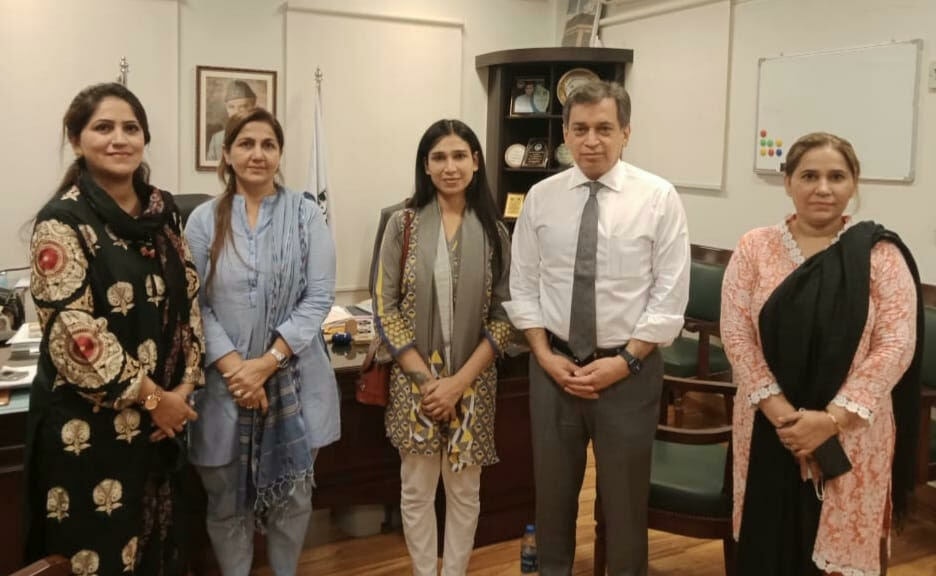 Dr Sara Gill (C) with JPMC Executive Director Prof. Shahid Rasool after receiving her employment offer. — Photo by Sindh CM House