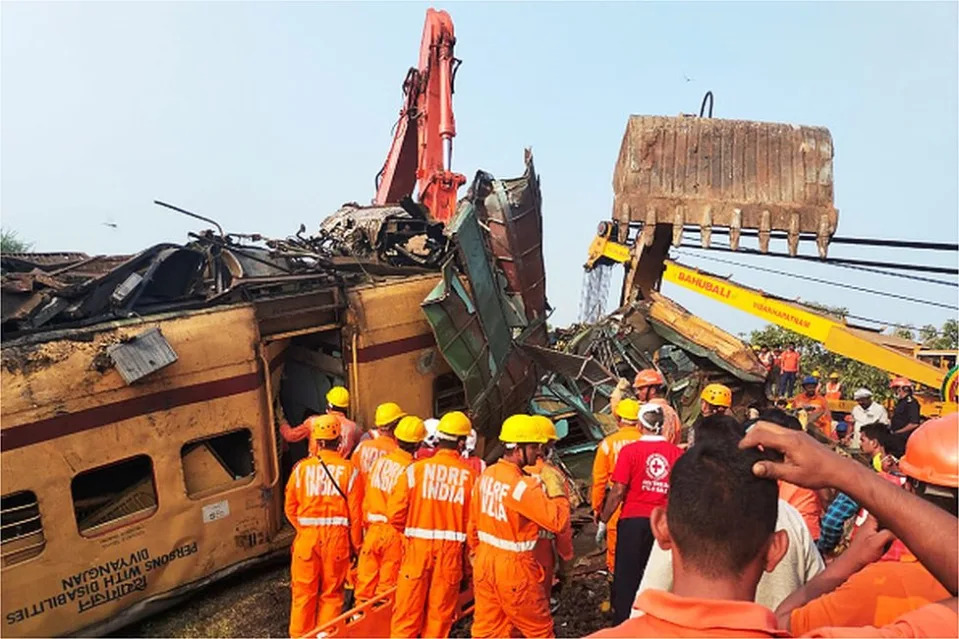 Members of the National Disaster Response Force (NDRF) conduct rescue operation at the site of train crash in Vizianagaram district of India's Andhra Pradesh state on October 30, 2023. A