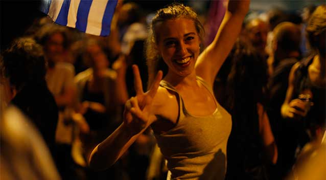 greece_bailout_vote_woman_peace.jpg