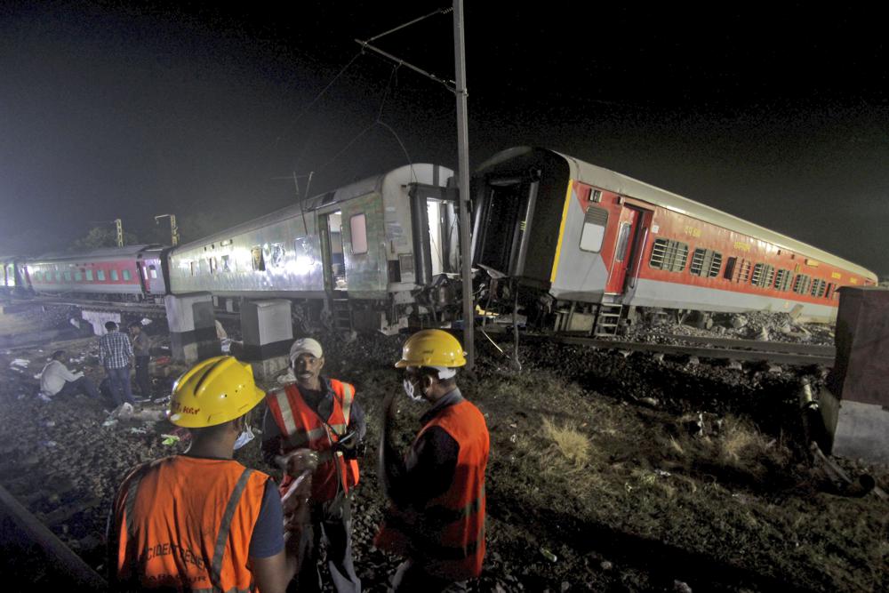 Rescuers work at the site of passenger trains accident, in Balasore district, in the eastern Indian state of Orissa, Saturday, June 3, 2023. Two passenger trains derailed in India, killing more than 200 people and trapping hundreds of others inside more than a dozen damaged rail cars, officials said. (AP Photo)