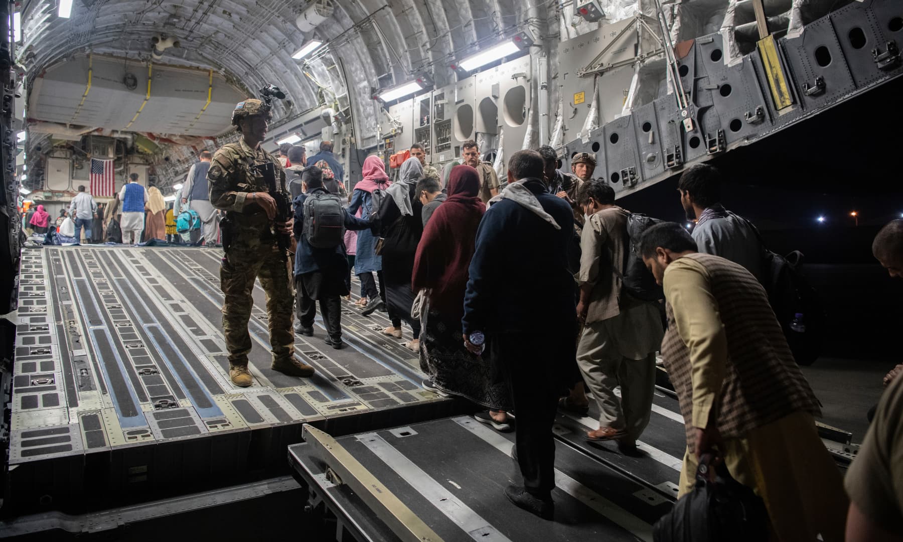 Afghan passengers board a US Air Force C-17 Globemaster III during the Afghanistan evacuation at Hamid Karzai International Airport in Kabul, Afghanistan on August 22, 2021. — AP