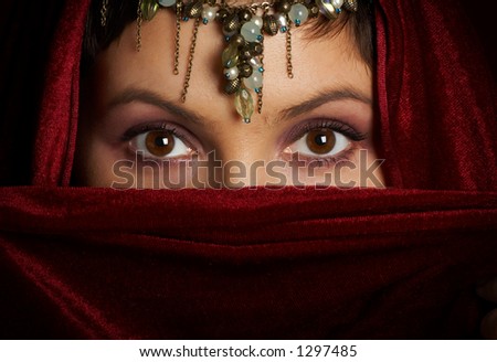 stock-photo-mysterious-eastern-woman-with-beautiful-eyes-1297485.jpg