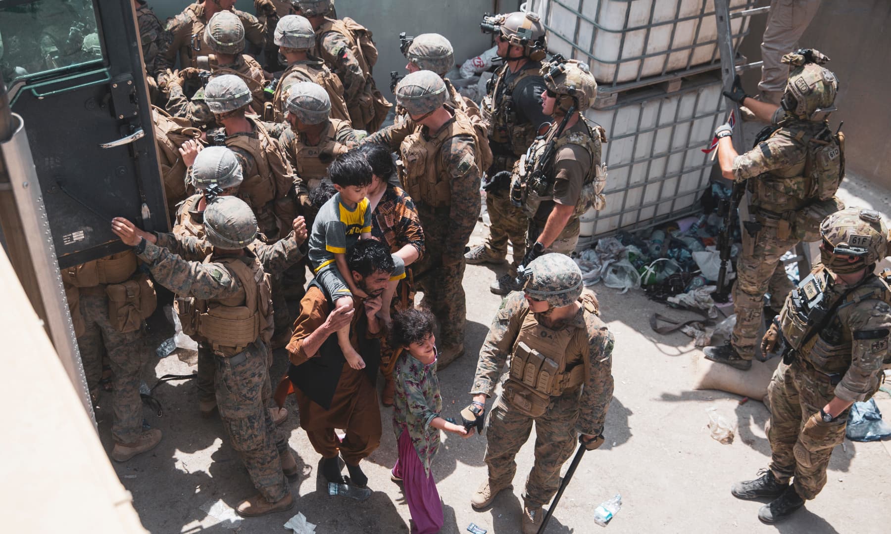 US Marines and Norweigian coalition forces assist with security at an Evacuation Control Checkpoint ensuring evacuees are processed safely during an evacuation at Hamid Karzai International Airport in Kabul, Afghanistan on August 20, 2021. — AP