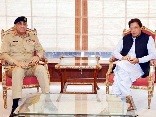 Gen Qamar calls on PM Imran. PHOTO: FILE