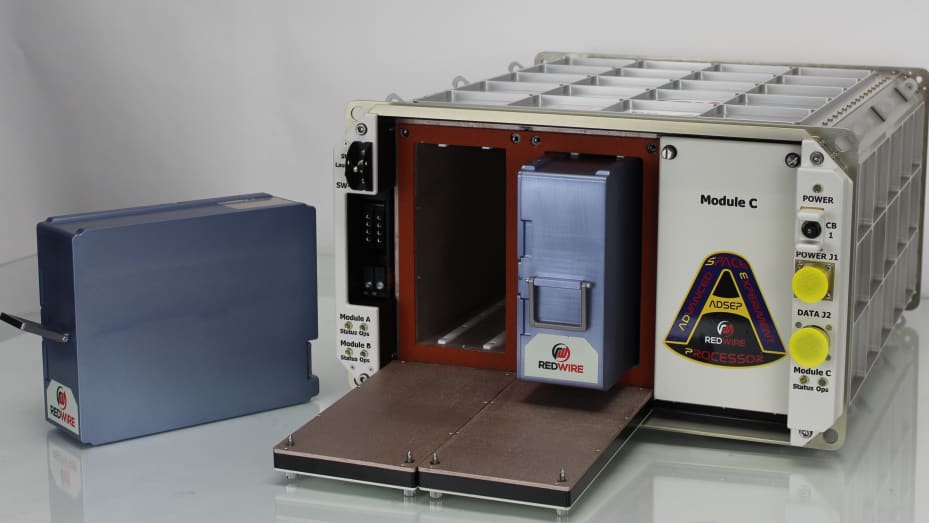 An ADSEP with blue PIL-BOXs, hardware which will be delivered to Sierra Space for the LIFE habitat pathfinder mission.