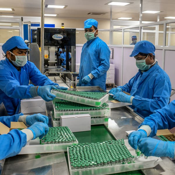 Workers packing boxes of vaccines at the Serum Institute in Pune, India, in January.