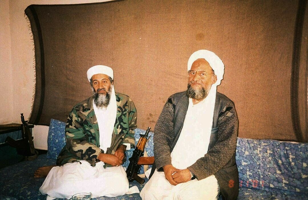 <p>Osama bin Laden sits with his adviser Ayman al-Zawahiri during an interview with journalist Hamid Mir (not pictured), November 10, 2001. — Reuters/File</p>