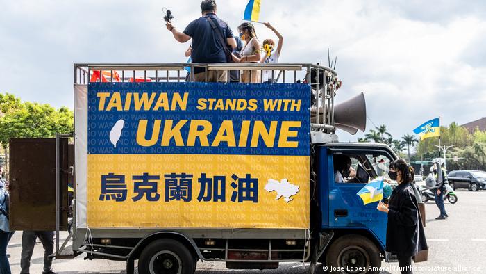A blue and yellow flagged pro-Taiwan protest truck in Taipei
