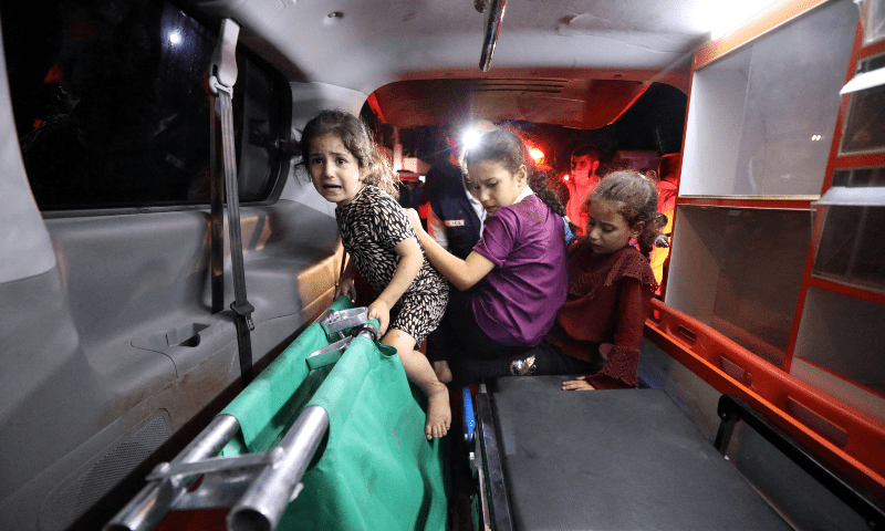  Children sit in the back of an ambulance at Shifa Hospital after an Israeli air strike hit the nearby Al-Ahli Hospital, according to Gaza Health Ministry in Gaza City, Gaza Strip, October 17. — Reuters 