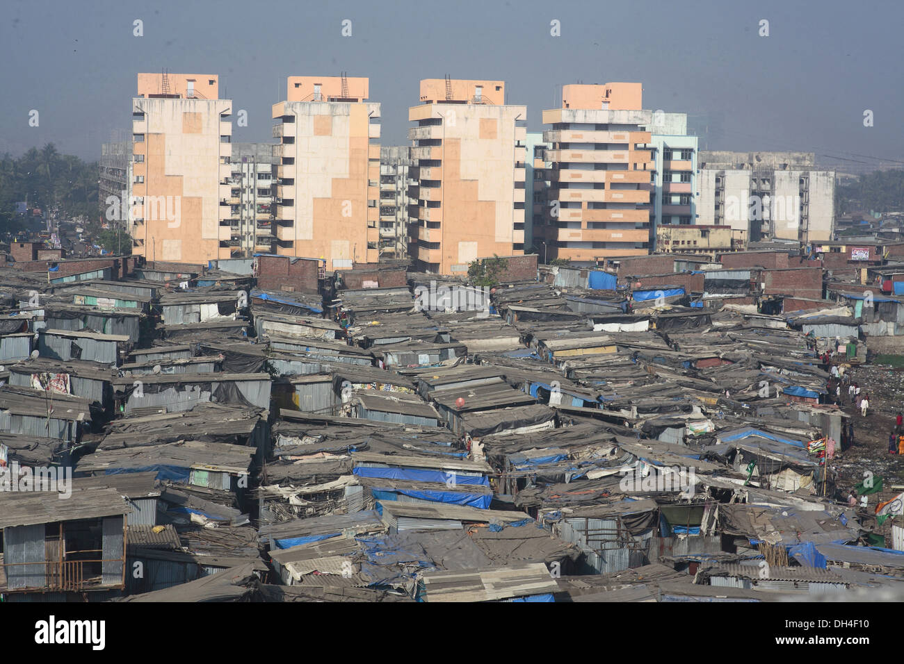 aerial-view-of-mankhurd-slums-and-modern-buildings-at-mumbai-india-DH4F10.jpg