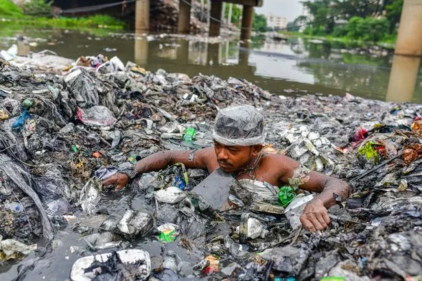 0_Volunteers-clean-up-the-riverbanks-in-Dhaka-Bangladesh-11-Jul-2020.jpg