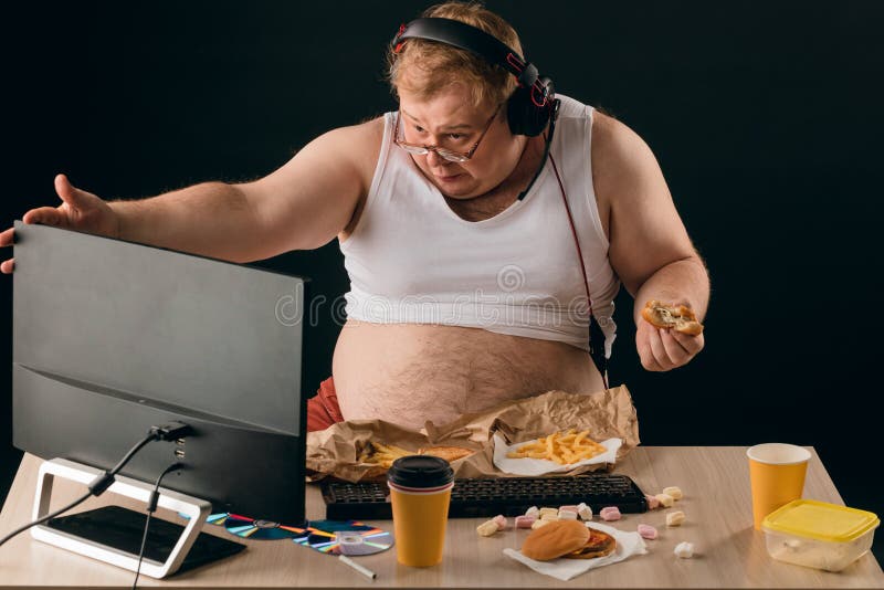 obese-man-talking-computer-close-up-portrait-isolated-black-background-lifestyle-concept-pastime-obese-man-talking-194453720.jpg