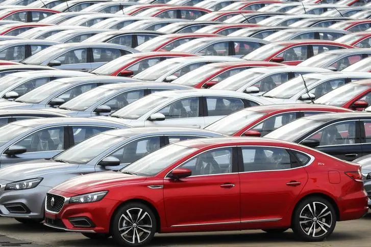 Cars for export wait to be loaded onto cargo vessels at a port in Lianyungang, Jiangsu province, China October 14, 2019. REUTERS/Stringer