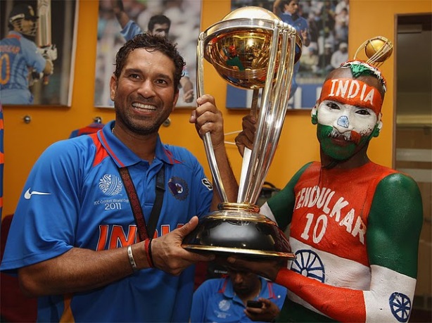 sachin-tendulkar-holds-aloft-the-world-cup-with-one-of-his-long-time-fans-sudhir-gautam-april-2-2011c2a9getty-images.jpg