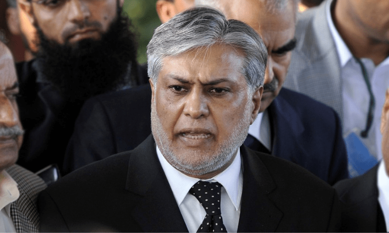 <p>In this file photo, PML-N leader and former finance minister Ishaq Dar speaks to the media. — AFP</p>