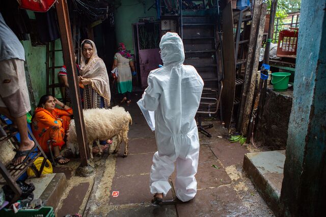 Sunanda Bhoyar, a community field worker steps into the field in Dharavi where she instructs people to wear masks, and helps in tracing the chain of the virus and documenting the same.