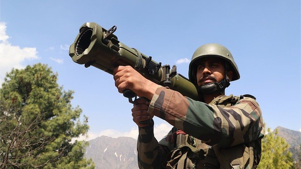 An Indian Army Soldier looks through a 84 MM RL Gun at a Forward Post at LoC Line Of Control in Uri, Baramulla, Jammu and Kashmir, India on 02 April 2022. T