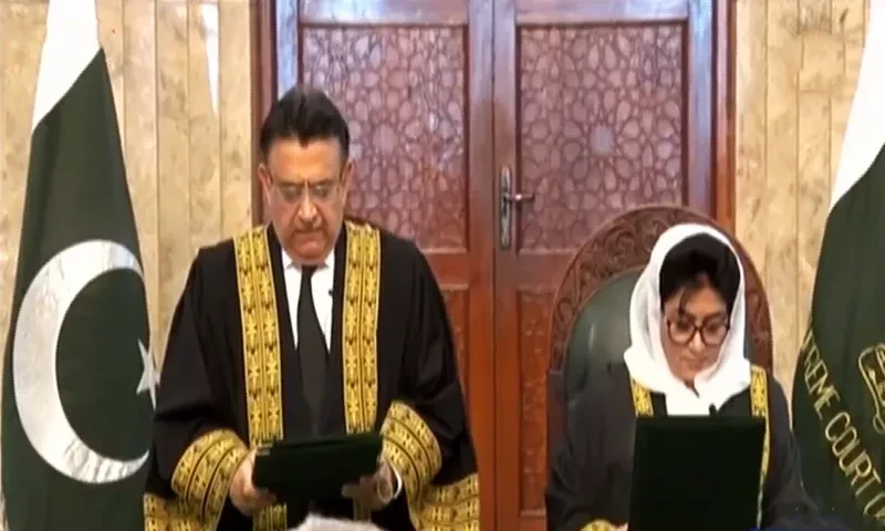 Chief Justice of Pakistan Umar Ata Bandial (left) administered the oath to Justice Mussarat Hilali on Friday morning. — DawnNewsTV