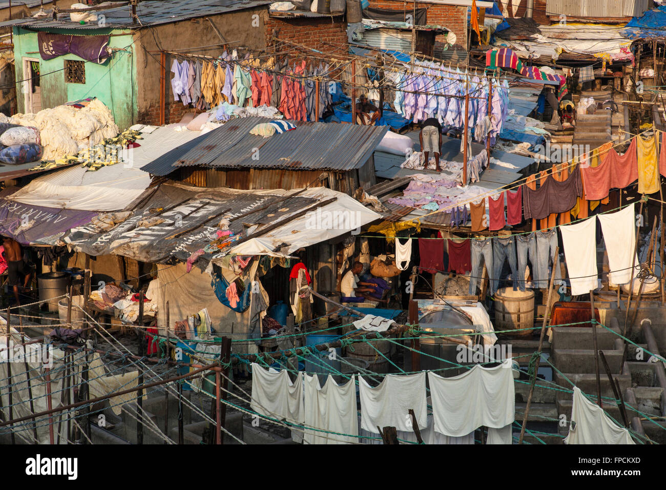 a-view-from-above-of-a-slum-in-mumbai-in-india-people-can-be-seen-FPCKXD.jpg