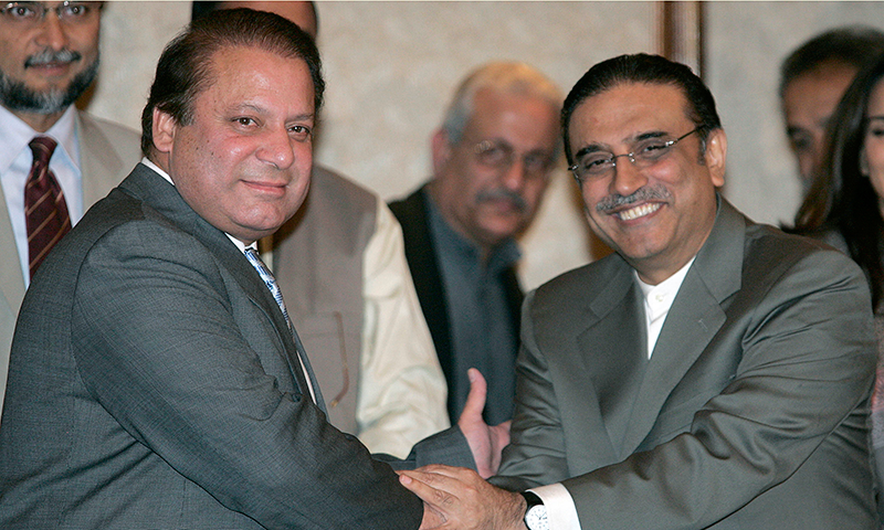 PML-N supremo Nawaz Sharif and PPP co-chairman Asif Ali Zardari shaking hands. —AP/File