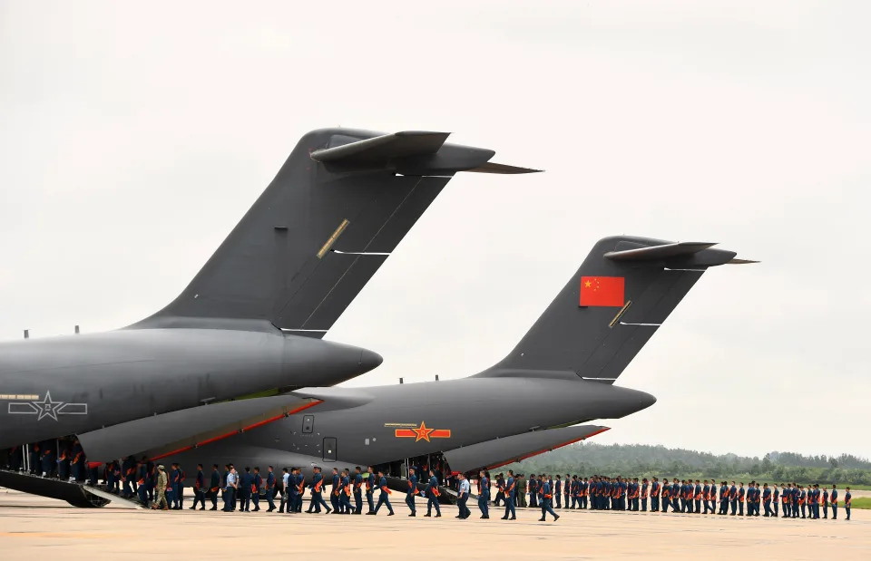 New flight cadets line up to board the Y-20 at an airport in Nanjing, Jiangsu province, China, July 20, 2023. The Air Force uses the Y-20 to welcome newly recruited Air cadets from six provinces and cities in Shanghai, Jiangsu, Zhejiang, Anhui, Jiangxi and Fujian to the Air Force Aviation University.