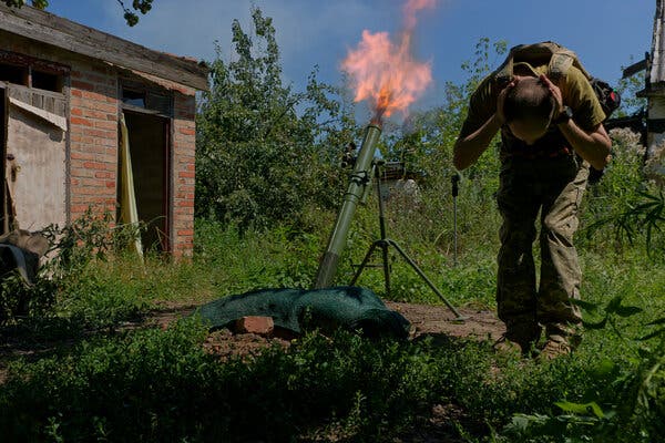 A member of the 24th Mechanized Brigade of the Ukrainian Army firing a mortar at a frontline position in the Donetsk region of eastern Ukraine on Tuesday.