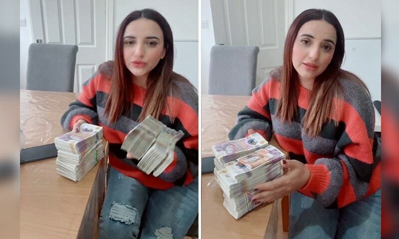 A screengrab from a viral video in which TikTok star Hareem Shah is seen saying she had travelled with a significant amount of cash from Pakistan to the United Kingdom. — DawnNews