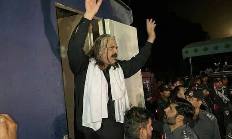 <p>A photo of PTI leader Amin Ali Gandapur during his alleged arrest on Thursday. — Photo courtesy; Taimur Khan Jhagra Twitter</p>