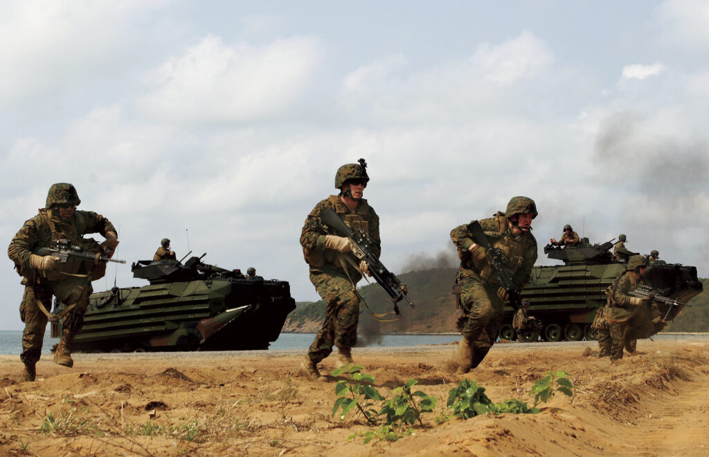 Marines-charge-ashore-from-AAV-7s-in-Thailand-exercise-100203-M-0000S-000-1024x661.jpg