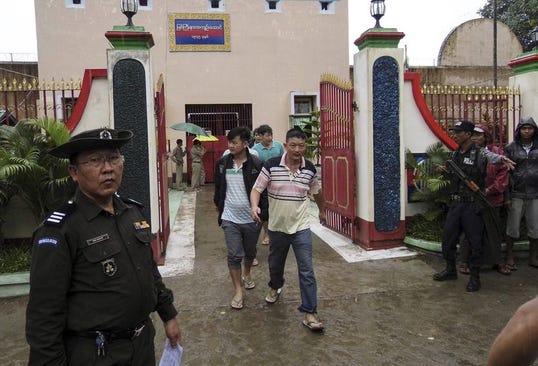 chinese-nationals-who-were-jailed-for-illegal-logging-walk-out-of-myitkyina-prison-after-being-released-during-an-amnesty-in-myitkyina-the-capital-of-kachin-state-north-of-myanmar-july-30-2015-reutersstringer.jpg