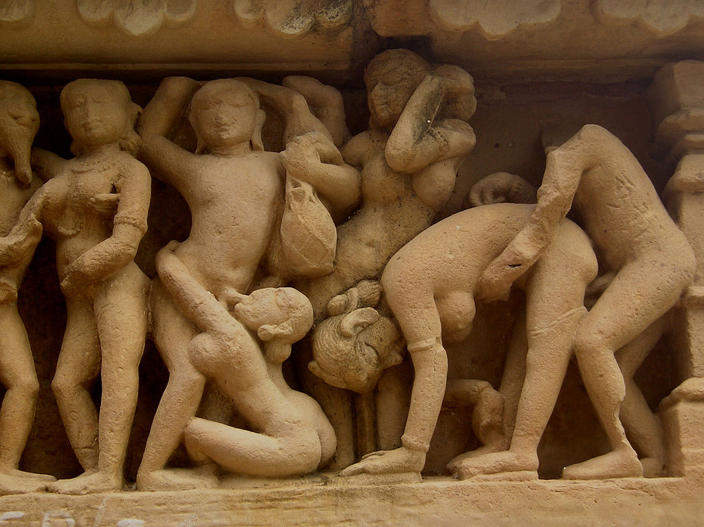 1024px-Khajuraho-Lakshmana_Temple_erotic_detal1.JPG
