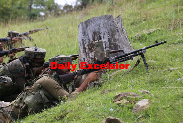 Security-forces-take-position-during-an-encounter-with-militants-at-Zachaldara-in-Handwara-on-Sunday-PHOTO-BY-AABID-NABI-1-copy.jpg