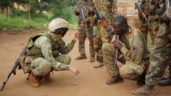 A Wagner Group mercenary gives a tactical training lesson to members of the armed forces of the Central African Republic in September. [Wagner]
