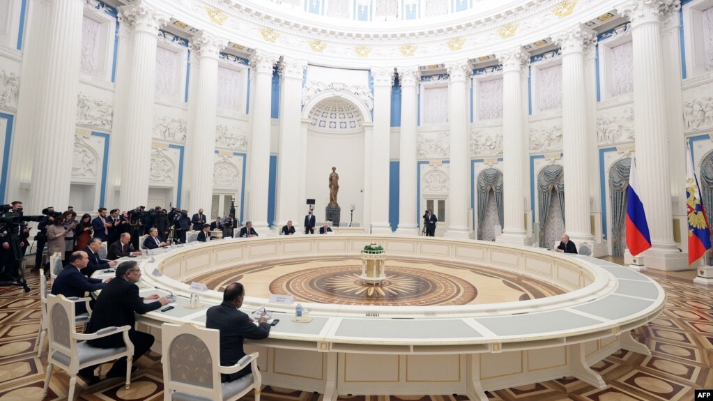 Russian President Vladimir Putin chairs a meeting with secretaries of foreign security councils on Afghan issues at the Kremlin in Moscow, Feb. 8, 2023.