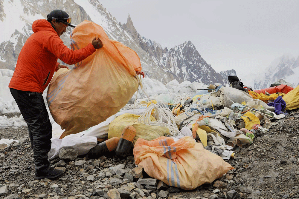  Over a week some 200 kilograms (400 pounds) of litter is hacked from the pinnacle’s frozen grip by Sadpara’s five-strong team.  AFP 