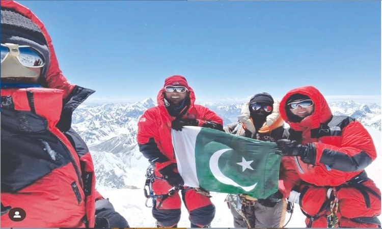Naila Kiani with Ali Raza Sadpara and Sirbaz Khan at the summit of G2