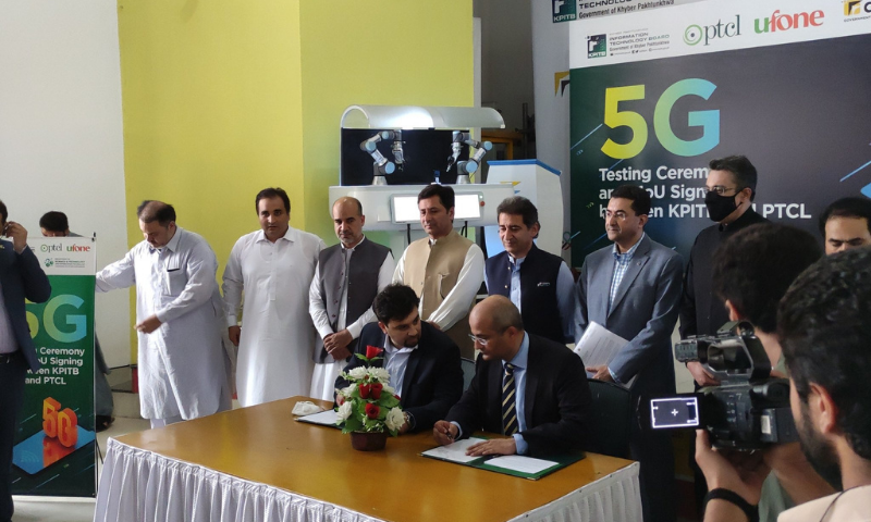 Officials of the Khyber Pakhtunkhwa Information Technology Board (KPITB) and the Pakistan Telecommunication Company Ltd (PTCL) sign a memorandum of understanding (MoU) to conduct 5G trials in Peshawar. — Photo courtesy KPITB Twitter