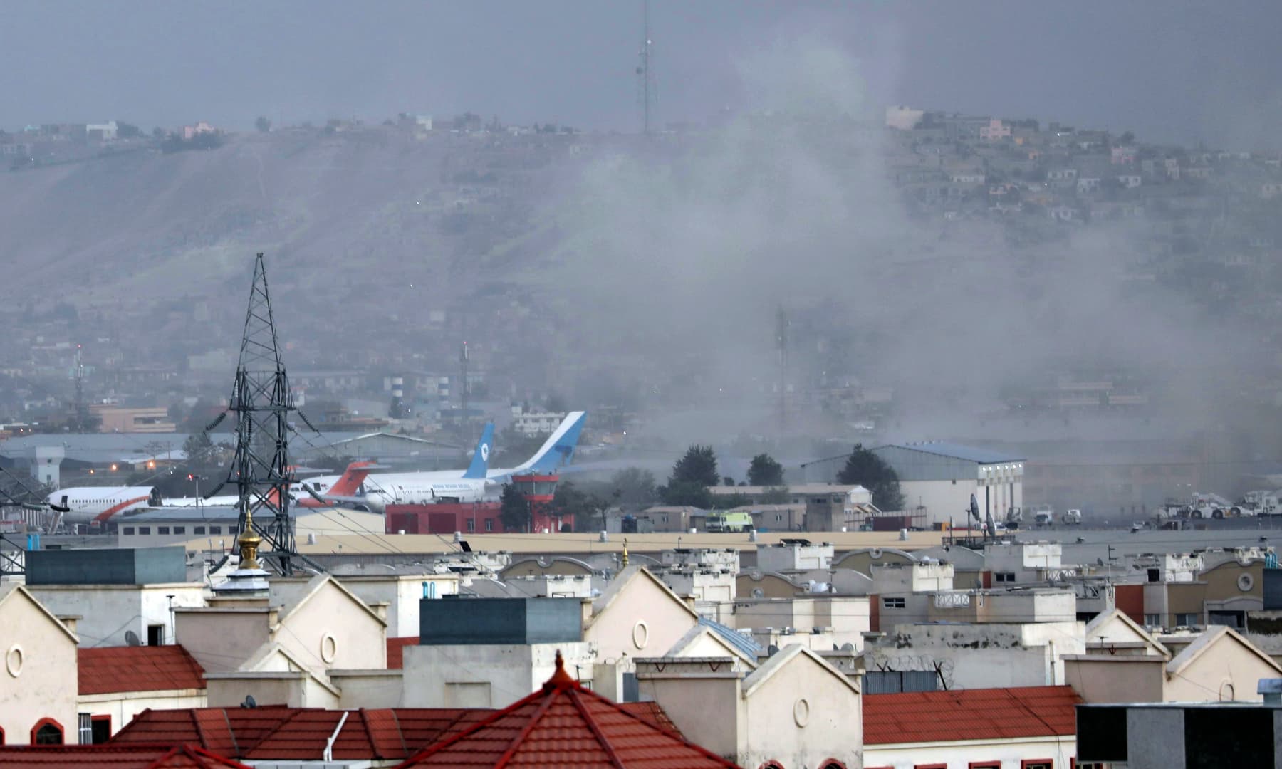 Smoke rises from a deadly explosion outside the airport in Kabul, Afghanistan on August 26, 2021. — AP