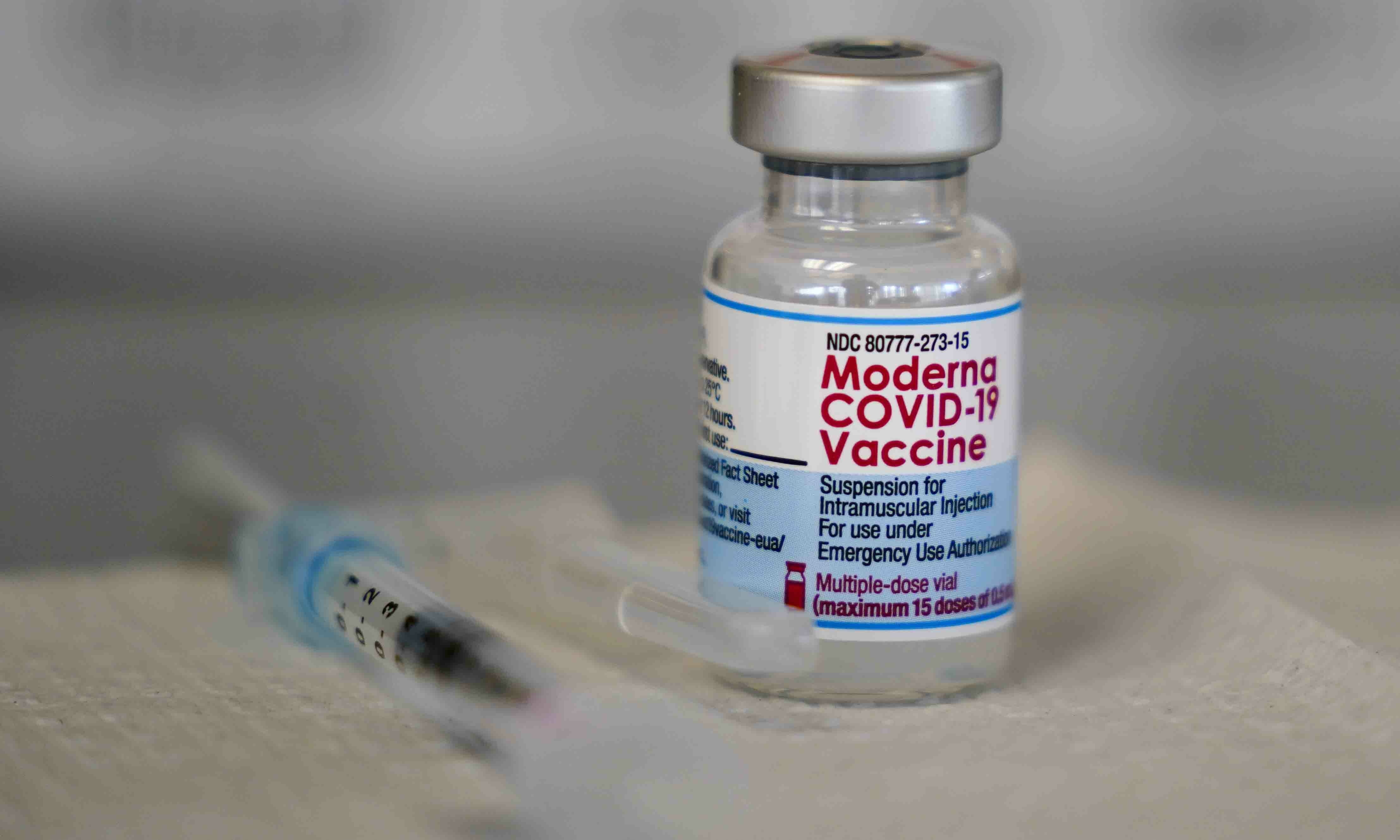 A vial of the Moderna Covid-19 vaccine is seen during a vaccination clinic at the Norristown Public Health Centre in Norristown, Pennsylvania on Dec 7. —AP
