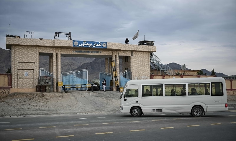 A bus carrying students enters the main gate of Laghman University in Laghman province, Afghanistan, February 2. — AFP